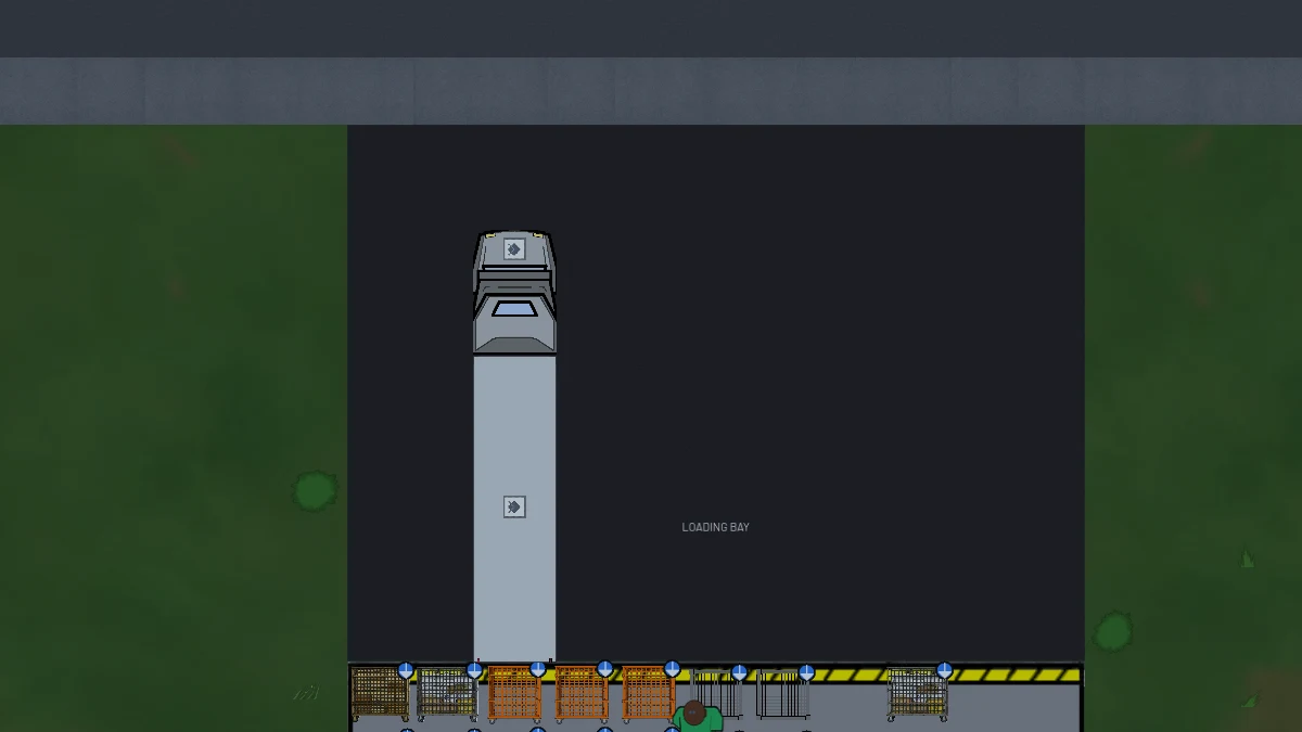 In-game: a truck backed into the loading dock beside the road
