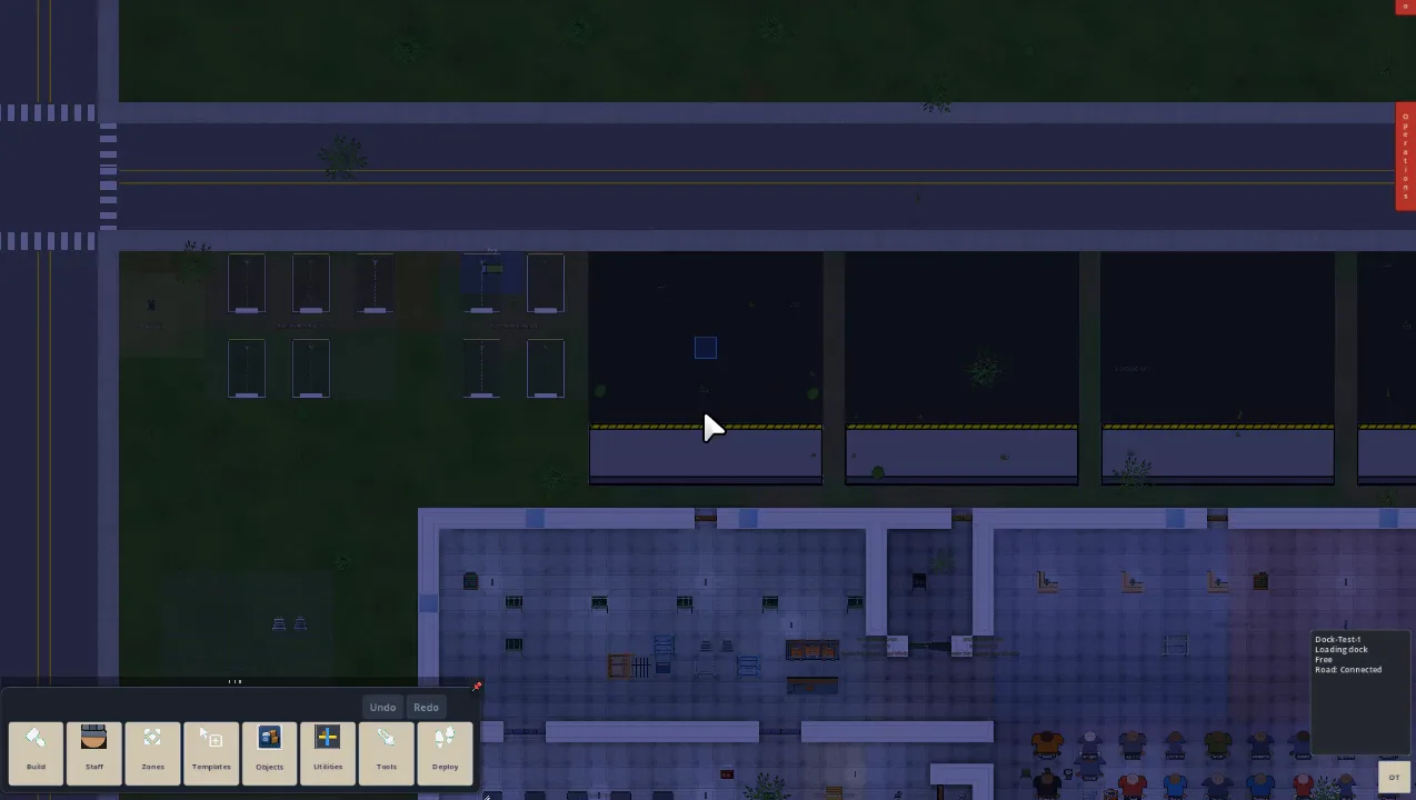 In-game: the facility at dusk, roads and docks